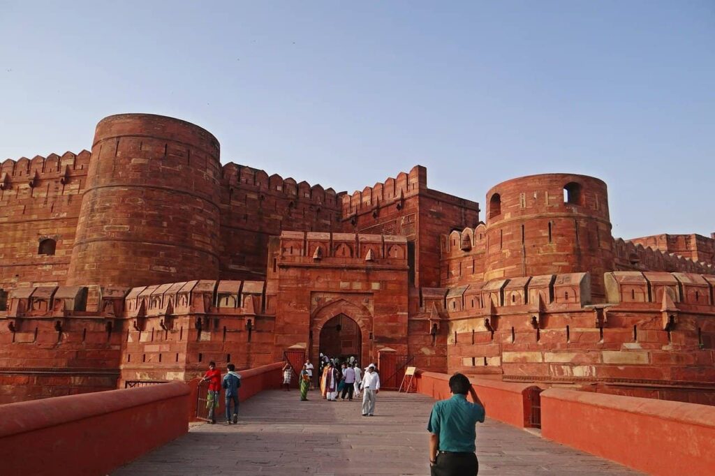 Agra Red fort entry gate with some people around, this is one of the best this to do in Agra. 