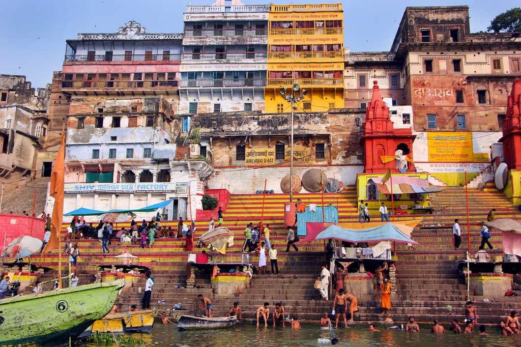 People taking bath in Ganga river at Varanasi Ghat. Varanasi Itinerary