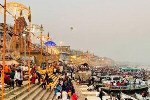 People are gathering on the Dashashwmedh ghat for evening Aarti